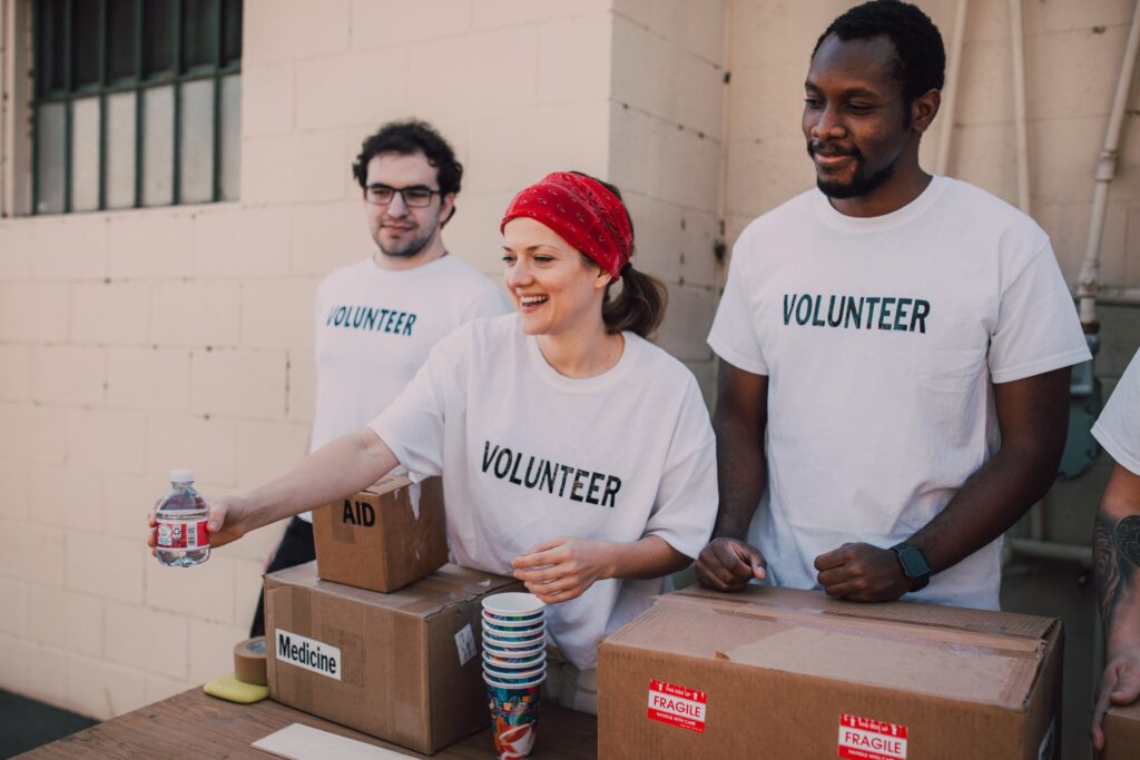 img2 audits for nonprofits, volunteers handing out food
